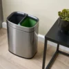 eb6ede_8e15e001f7a647fdb3eaf150cd351026~mv2 NEWPORT 12L dual recycling bin โ brushed steel, angled view in guestroom
