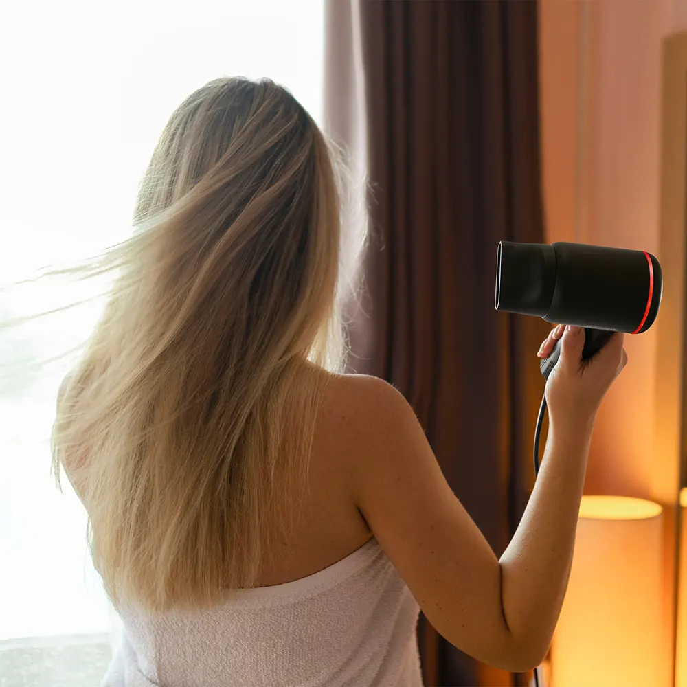 eb6ede_9991a2abb86f4506b95660c8c472c173~mv2 SKYE hotel hair dryer – lifestyle photo in guestroom setting
