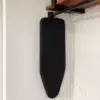 MINI tabletop ironing board hanging in hotel wardrobe