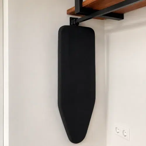 MINI tabletop ironing board hanging in hotel wardrobe